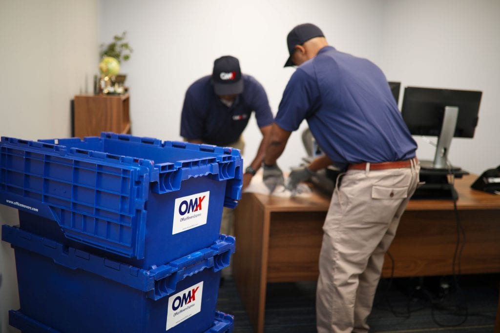 OMX movers packing up office