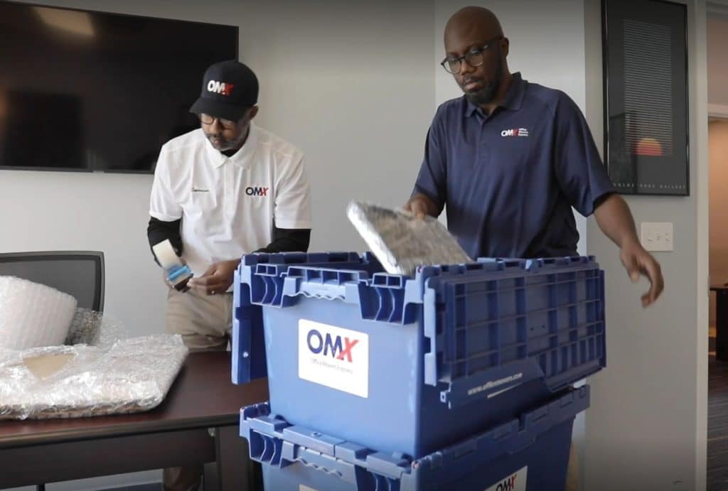 Movers packing items